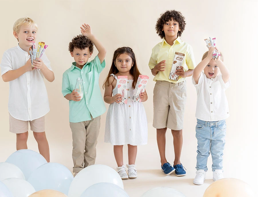 Children showing Sipahh Flavored Milk Straws