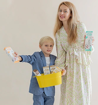 Mom and son holding Sipahh Flavored Milk Straws
